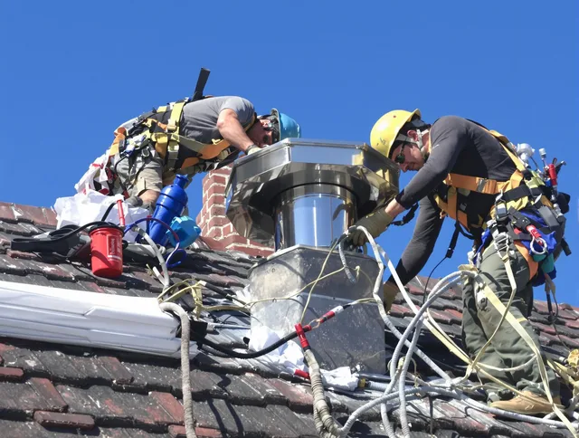 Protective chimney cap installed by Homestead Chimney Sweep in Homestead, FL